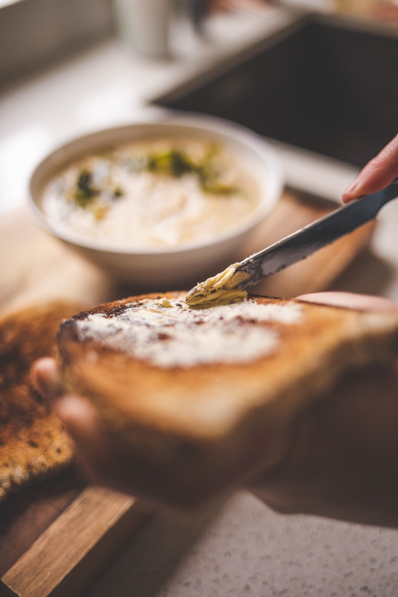 Buttering toast