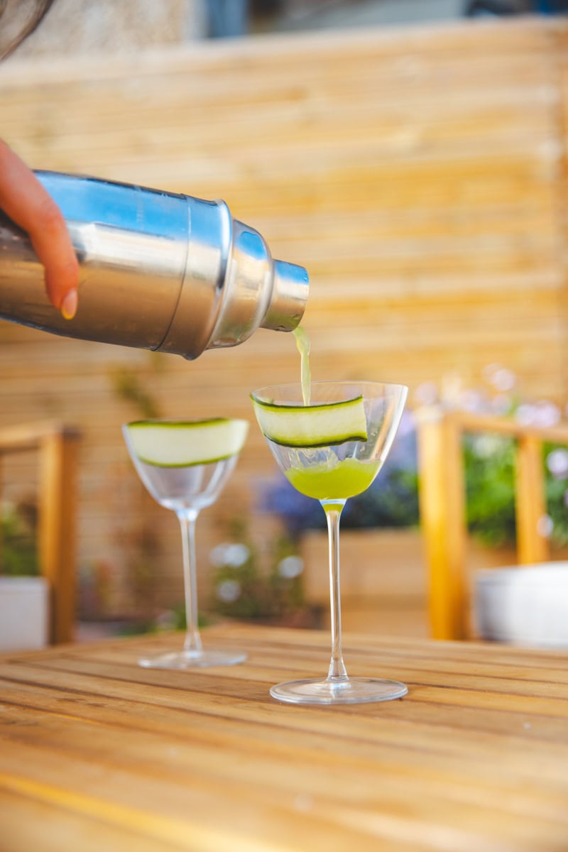Pouring the Basil Gimlet - Georgie Eats